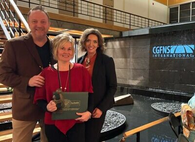 Christy Craft receiving the CGFNS DAISY Award for Outstanding International Nurse Recruiter